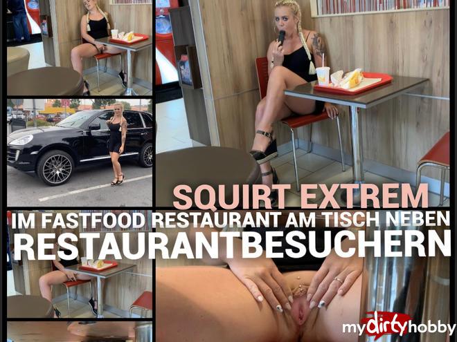 Squirt extremely - in the fast food restaurant at the table next to restaurant visitors satisfied Squirt extremely - in the fast food restaurant at the table next to restaurant visitors satisfied