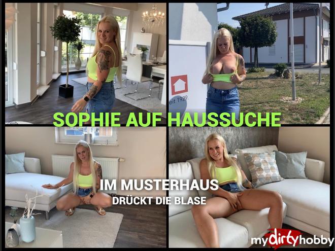 Sophie on a house search - in the model house pressed the bubble, P